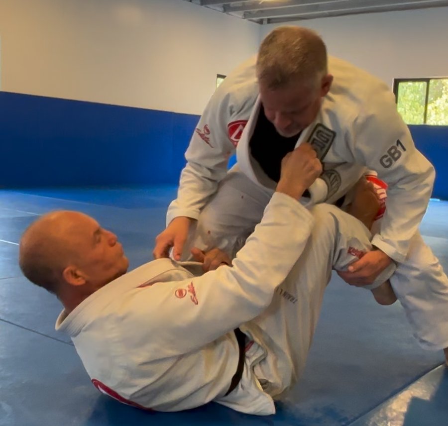 Kevin Brown rolling in Brazilian Jiu-Jitsu, working a guard-passing exchange